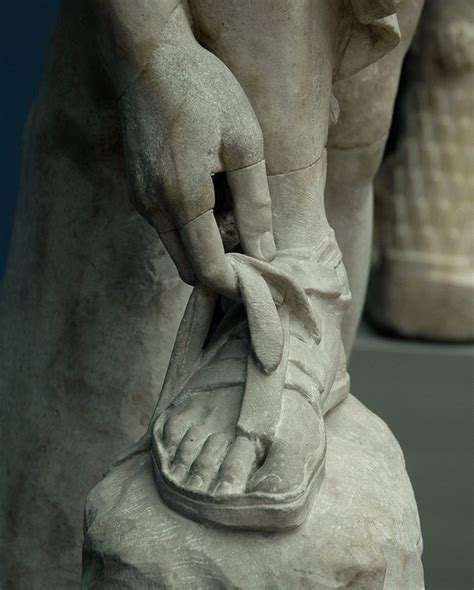 picture og hermes putting sandal on|hermes sandals statue.